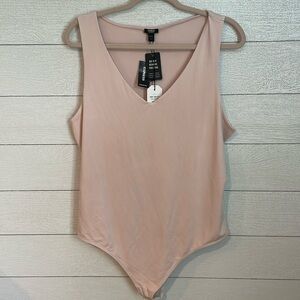 Express Women's light pink body contour compression bodysuit size XL NWT!